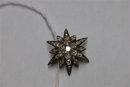 A Victorian gold, silver and old mine and cushion cut diamond set starburst pendant brooch,